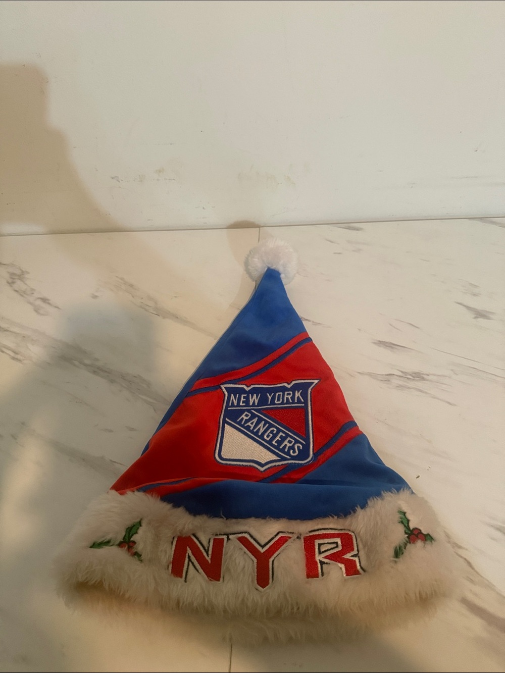 Forever Collectibles New York Rangers Blue and Red Holiday Santa Hat